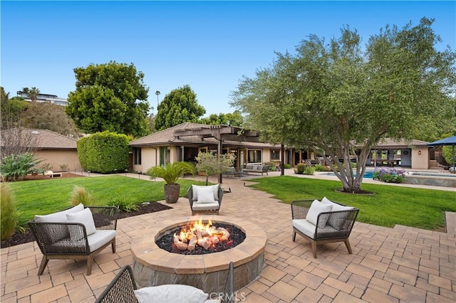 2291 Pavillion Dr, North Tustin, CA 92705 - view of patio with an outdoor living space with a fire pit