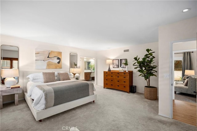 2291 Pavillion Dr, North Tustin, CA 92705 - bedroom with ensuite bath, visible vents, and carpet floors