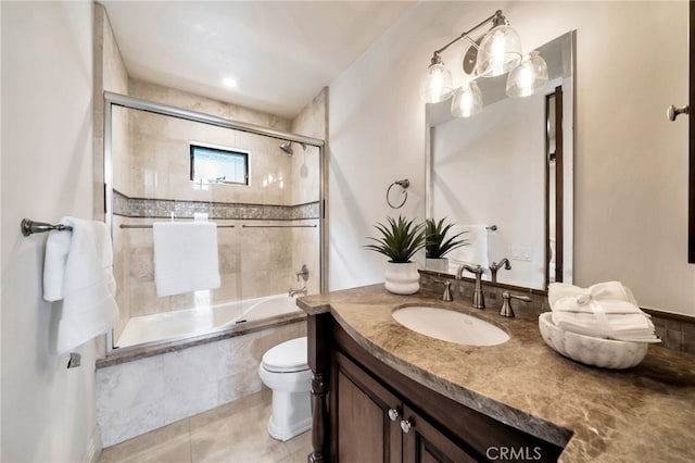 4301/2 Heliotrope Ave, Corona Del Mar, CA 92625 - bathroom with vanity, tile patterned floors, combined bath / shower with glass door, and toilet