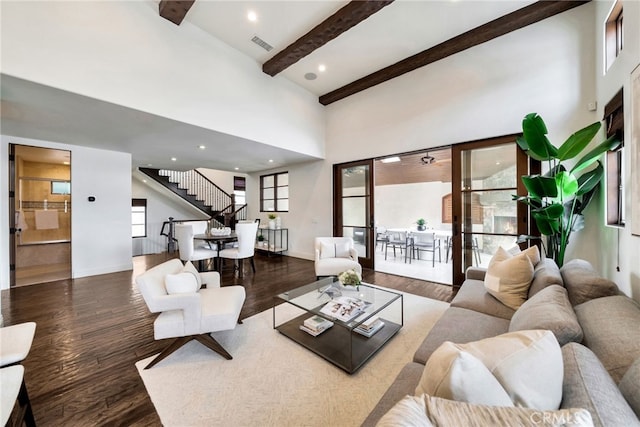 4301/2 Heliotrope Ave, Corona Del Mar, CA 92625 - living area featuring beamed ceiling, stairs, wood finished floors, and visible vents