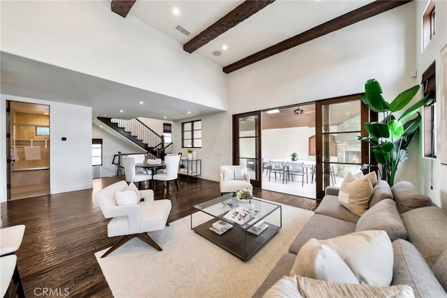 4301/2 Heliotrope Ave, Corona Del Mar, CA 92625 - living room featuring stairway, beam ceiling, wood finished floors, and a high ceiling