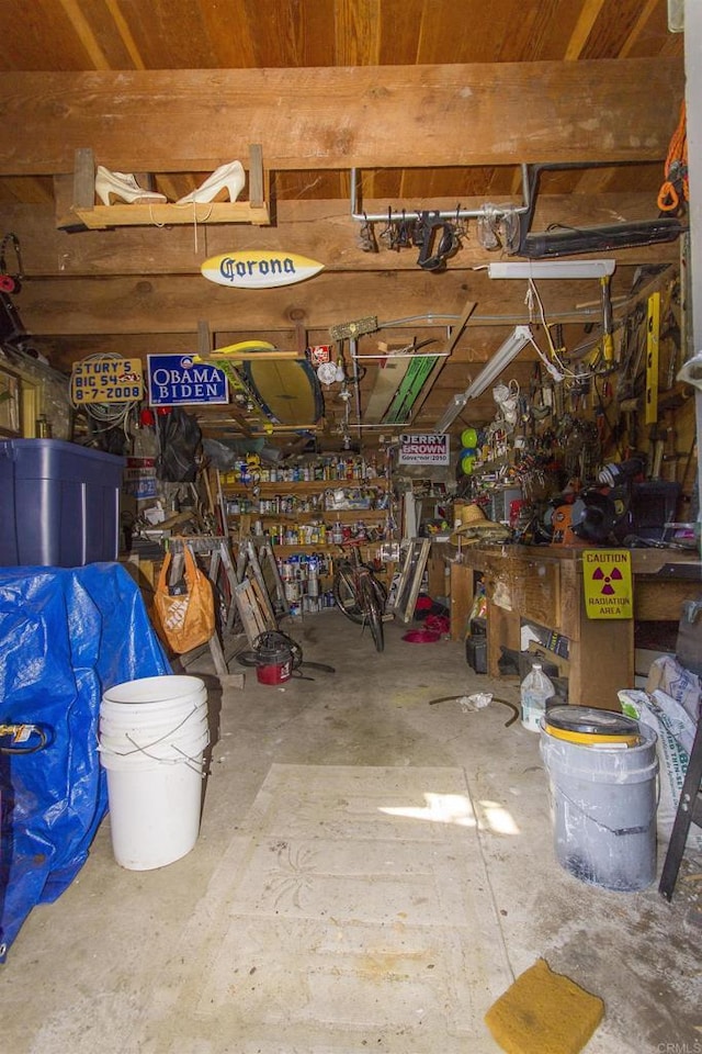28831 Spruce Rd, Pine Valley, CA 91962 - garage with a workshop area and wooden ceiling