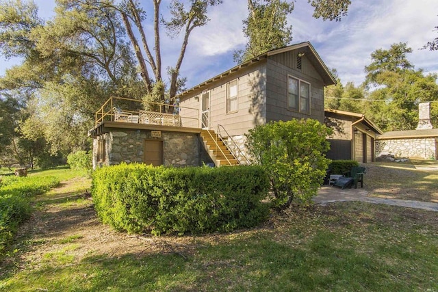 28831 Spruce Rd, Pine Valley, CA 91962 - view of side of home with stairway, stone siding, a garage, a wooden deck, and driveway