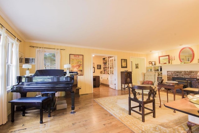 28831 Spruce Rd, Pine Valley, CA 91962 - living room featuring ornamental molding, light wood-style flooring, and a brick fireplace