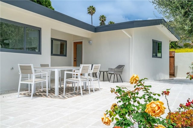 8 Clipper Rd, Rancho Palos Verdes, CA 90275 - back of property with outdoor dining space, stucco siding, and a patio area
