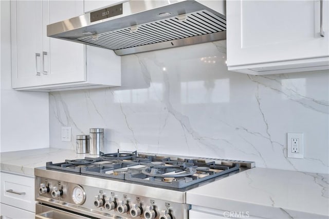 8 Clipper Rd, Rancho Palos Verdes, CA 90275 - kitchen with white cabinetry, stainless steel gas range oven, backsplash, and range hood