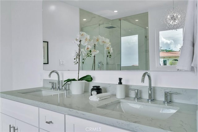 8 Clipper Rd, Rancho Palos Verdes, CA 90275 - bathroom featuring double vanity, a stall shower, and a sink