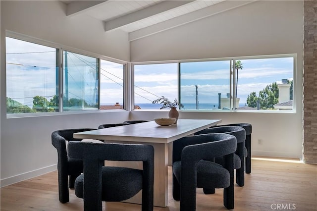 8 Clipper Rd, Rancho Palos Verdes, CA 90275 - dining space featuring wooden ceiling, light wood-style floors, lofted ceiling with beams, and baseboards