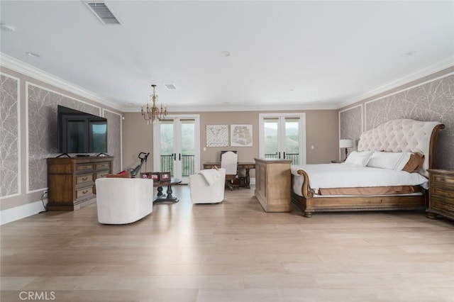 bedroom with wallpapered walls, visible vents, multiple windows, and french doors
