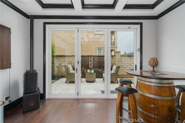 doorway with crown molding, coffered ceiling, french doors, and dark wood-style floors