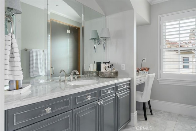 bathroom featuring crown molding, marble finish floor, baseboards, and vanity
