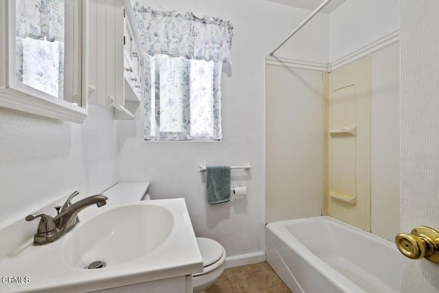 full bath with shower / tub combination, tile patterned flooring, vanity, toilet, and baseboards