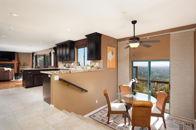 3351 Red Mountain Heights Dr, Fallbrook, CA 92028 - kitchen featuring decorative backsplash, a peninsula, open floor plan, and a wealth of natural light