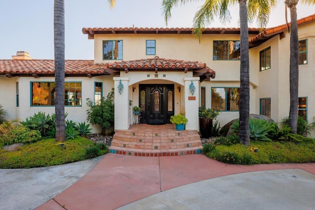 3351 Red Mountain Heights Dr, Fallbrook, CA 92028 - mediterranean / spanish-style house with a tiled roof, a chimney, a porch, and stucco siding
