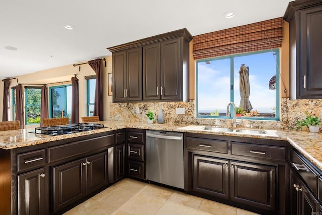 3351 Red Mountain Heights Dr, Fallbrook, CA 92028 - kitchen featuring stainless steel dishwasher, decorative backsplash, black gas cooktop, light stone counters, and dark brown cabinets