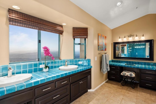 3351 Red Mountain Heights Dr, Fallbrook, CA 92028 - bathroom with vaulted ceiling, double vanity, backsplash, recessed lighting, and tile patterned floors