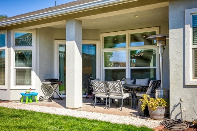 view of patio featuring outdoor dining area