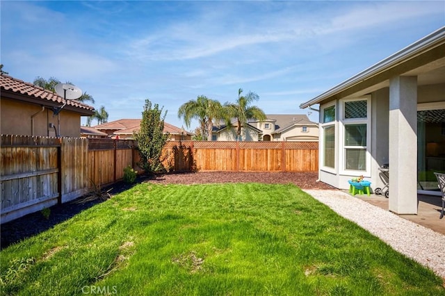 view of yard featuring a fenced backyard