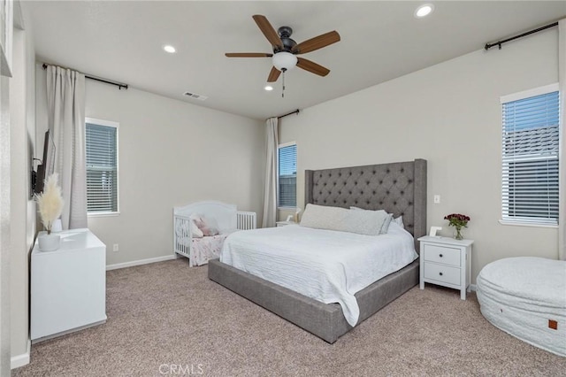bedroom with recessed lighting, visible vents, carpet floors, and baseboards