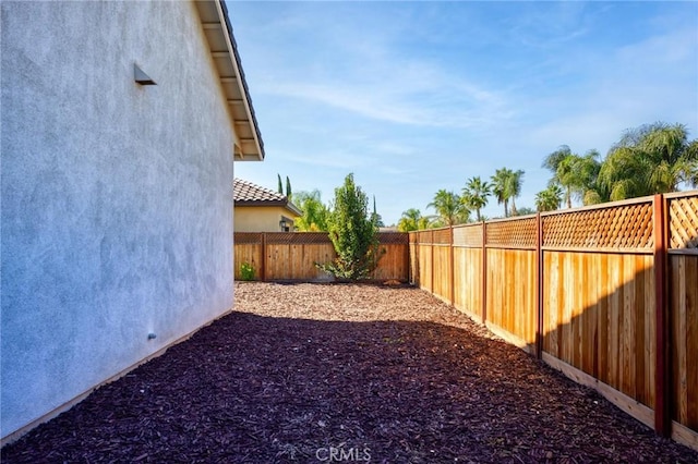 view of yard featuring a fenced backyard