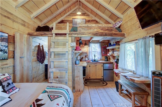 bedroom with fridge, light wood finished floors, wooden ceiling, lofted ceiling with beams, and wood walls