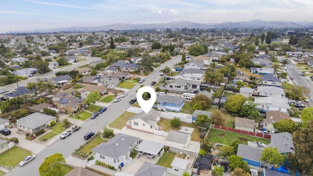 drone / aerial view with a mountain view and a residential view