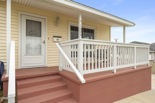 entrance to property with covered porch