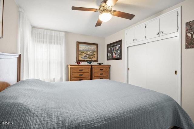 bedroom featuring a closet and ceiling fan