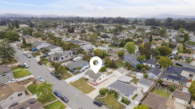 bird's eye view featuring a mountain view and a residential view