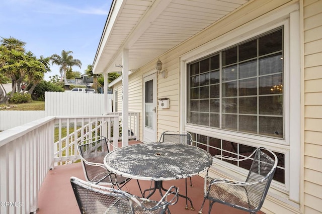 deck with outdoor dining space