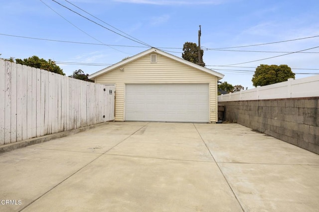 detached garage with fence