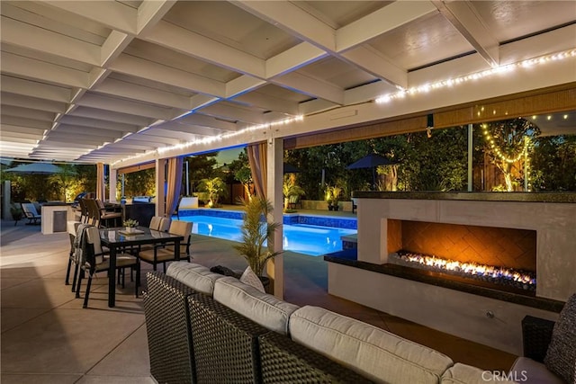 pool featuring outdoor dining space, a patio area, and an outdoor hangout area