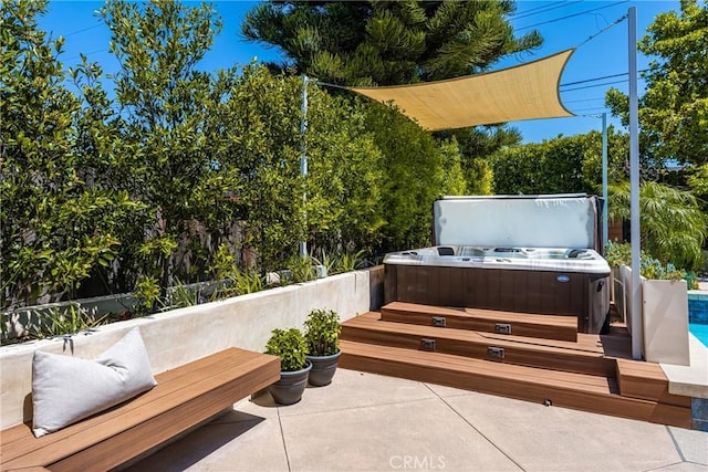 view of patio with a hot tub