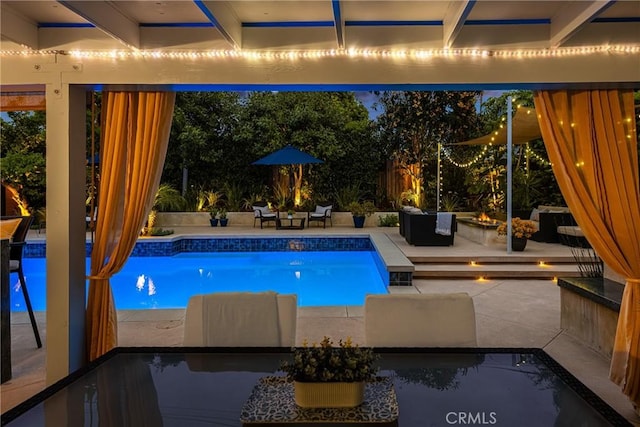 pool featuring a patio