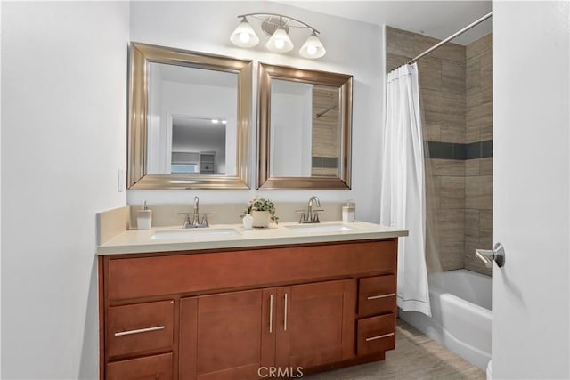 full bathroom featuring double vanity, a sink, and shower / bath combo with shower curtain