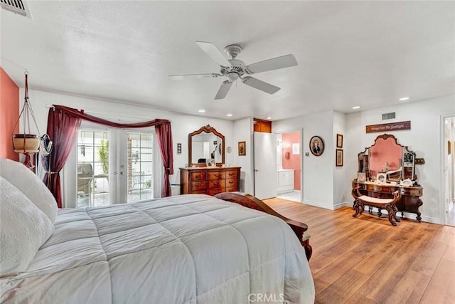 bedroom featuring recessed lighting, light wood-type flooring, and visible vents
