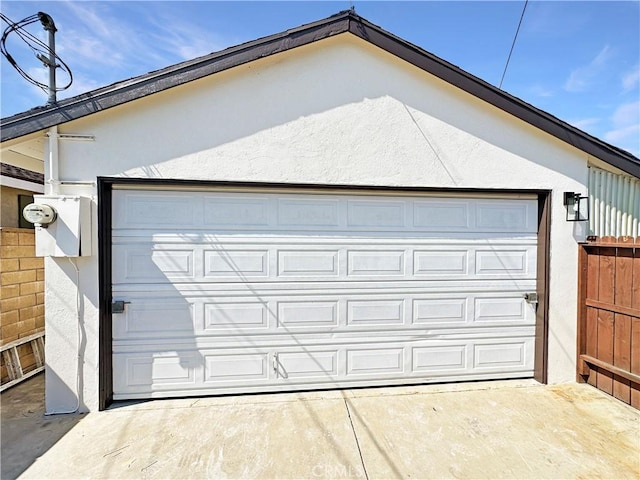 garage featuring fence