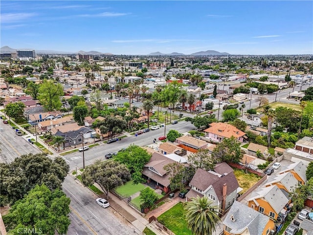 drone / aerial view featuring a mountain view and a residential view