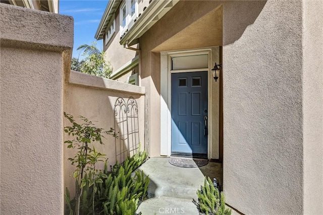 11 Santa Cruz Aisle, Irvine, CA 92606 - view of exterior entry with stucco siding