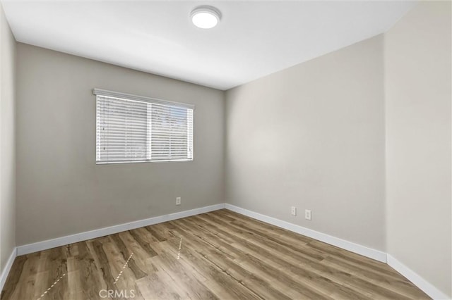 11 Santa Cruz Aisle, Irvine, CA 92606 - empty room featuring wood finished floors and baseboards