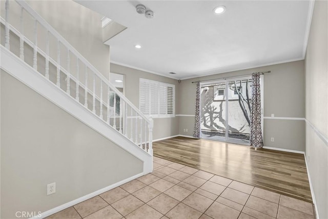 11 Santa Cruz Aisle, Irvine, CA 92606 - unfurnished room with crown molding, baseboards, recessed lighting, tile patterned floors, and stairs
