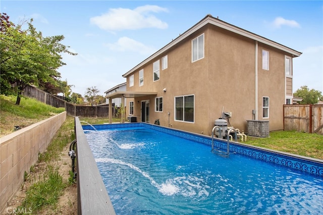 view of pool featuring a fenced backyard and a fenced in pool