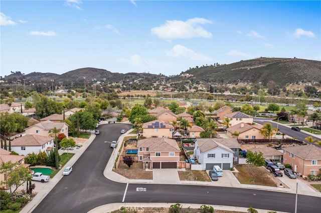 bird's eye view with a mountain view and a residential view