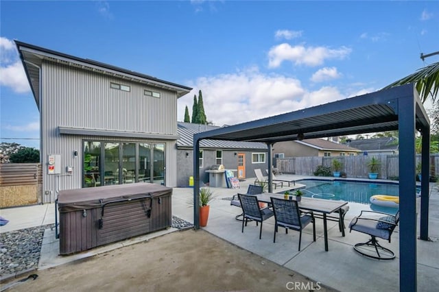 view of patio with a fenced backyard, a fenced in pool, and a hot tub