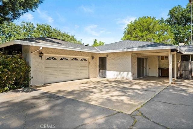 1 Piedmont Cir, Chico, CA 95926 - ranch-style home with driveway, stucco siding, a garage, and an attached carport