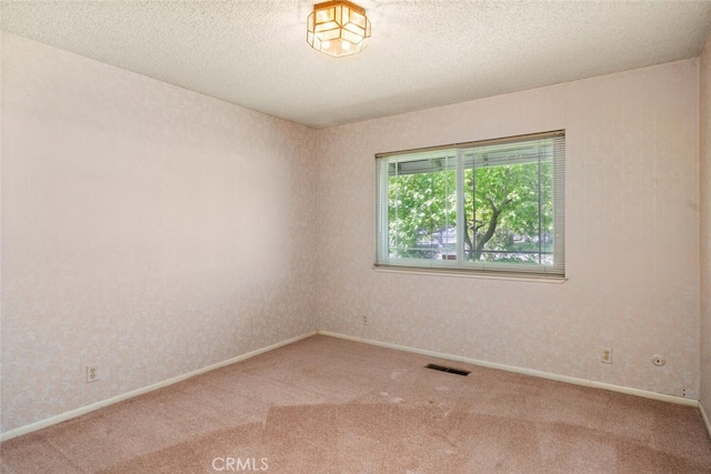 1 Piedmont Cir, Chico, CA 95926 - empty room with carpet floors and a textured ceiling