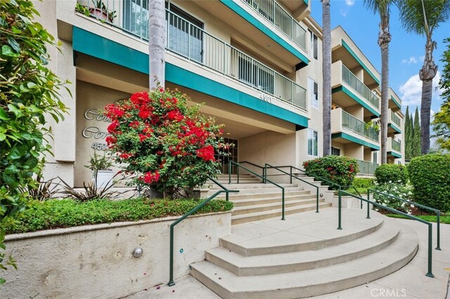 view of building exterior with stairway