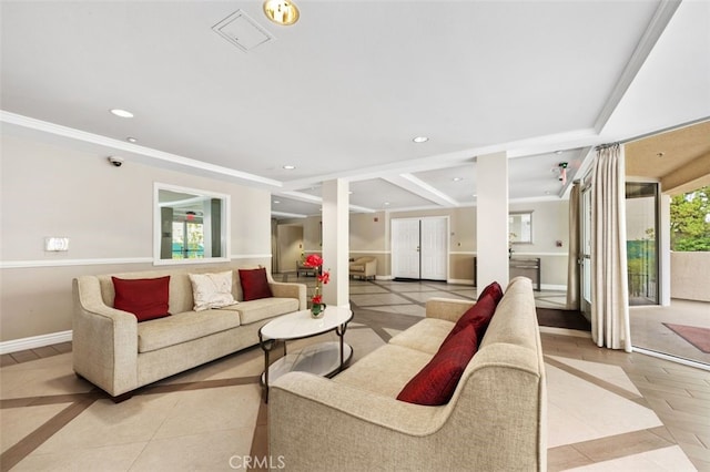 living room with inlaid floor details, recessed lighting, baseboards, and light tile patterned flooring