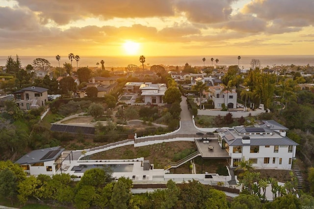 aerial view with a residential view and a water view