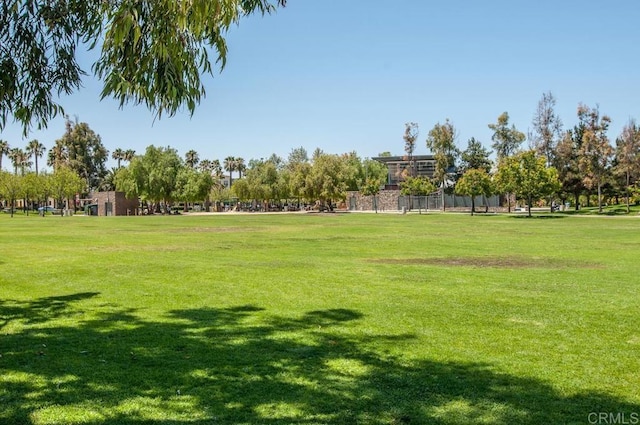 view of home's community featuring a lawn